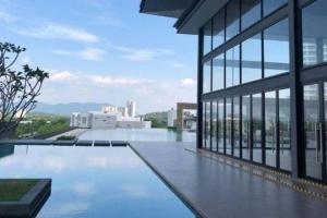 a pool on the roof of a building at AYMAR Homestay, Residensi Lily, Nilai in Nilai