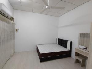 Postel nebo postele na pokoji v ubytování GP Hostel Penang