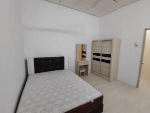 Postel nebo postele na pokoji v ubytování GP Hostel Penang