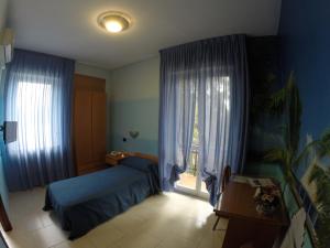 Postel nebo postele na pokoji v ubytování Flying Hotel
