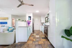 A kitchen or kitchenette at Tranquil 3BR King Home, Pool, BBQ