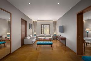 Time Square Resort & Spa Bhuj客房内的一张或多张床位