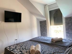 Postel nebo postele na pokoji v ubytování PALMandre (Pag Apartment Luxurious)