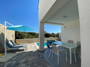 Balkón nebo terasa v ubytování PALMandre (Pag Apartment Luxurious)