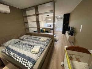Postel nebo postele na pokoji v ubytování Apartmány Luxor Zemplínska Šírava