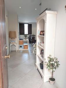 Kuchyň nebo kuchyňský kout v ubytování Triana Procurador con Terraza Privada