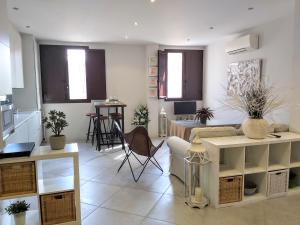 Posezení v ubytování Triana Procurador con Terraza Privada