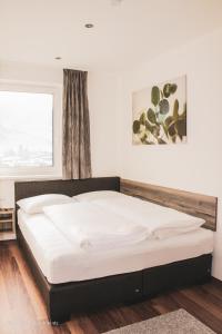 Postel nebo postele na pokoji v ubytování TheView Green