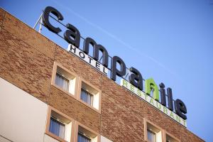 a sign on the top of a building at Campanile Paris Ouest - Nanterre - La Défense in Nanterre