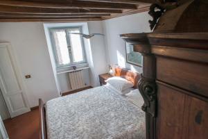A bed or beds in a room at Indimenticabili VACANZE ROMANE nel cuore della città