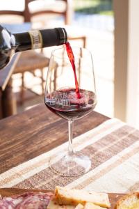 Nápoje v ubytovaní Agriturismo Tenuta Di Mensanello