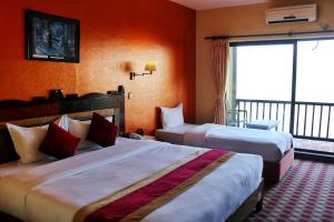 Postel nebo postele na pokoji v ubytování Hotel Chautari pvt ltd + 37 fotografií