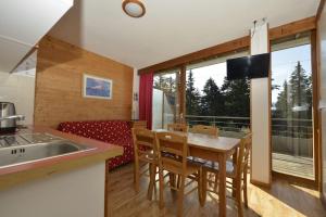 Kuchyň nebo kuchyňský kout v ubytování Appartement 35m2 chamrousse