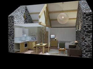 a kitchen and living room with a stone wall at Y Stwdio, Ferm Glandwr in Barmouth +16 photos