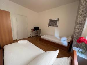Łóżko lub łóżka w pokoju w obiekcie B&B Civico 40