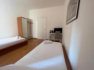 Łóżko lub łóżka w pokoju w obiekcie B&B Civico 40