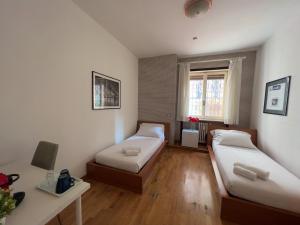 Łóżko lub łóżka w pokoju w obiekcie B&B Civico 40