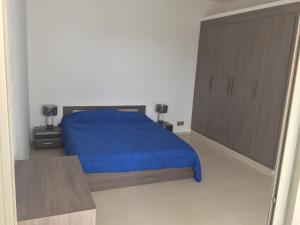 Postel nebo postele na pokoji v ubytování AYA Mermoz - Superbe appartement dans une résidence récente
