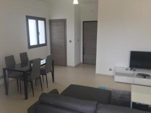 Posezení v ubytování AYA Mermoz - Superbe appartement dans une résidence récente