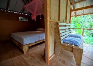 Letto o letti in una camera di Sigiriya River Side Villa