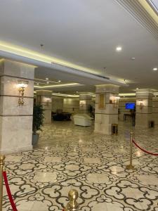 a lobby of a hotel with a large room with a lobby at فندق كارم مكة - Karim Makka Hotel in Mecca