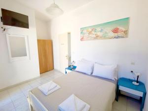 Posteľ alebo postele v izbe v ubytovaní Captain's Beach Apartments