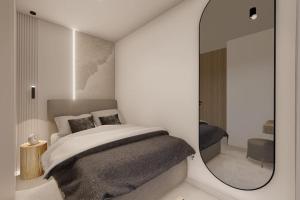 מיטה או מיטות בחדר ב-HEAVEN HILLS 23 - connection of nature and luxury