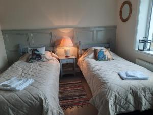 Postel nebo postele na pokoji v ubytování Heather House on the Wild Atlantic Way