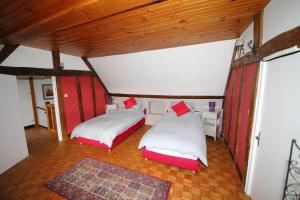 Postel nebo postele na pokoji v ubytování Chez Robins