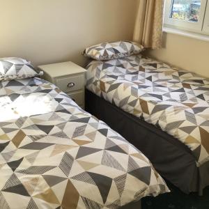 Katil atau katil-katil dalam bilik di Bobs plac