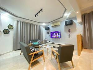 TV a/nebo společenská místnost v ubytování Home in Johor Bahru