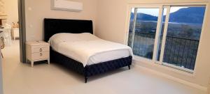Ένα ή περισσότερα κρεβάτια σε δωμάτιο στο Airport Blue Eye Apartment Dalaman best Location also suitable for day rentals ideal for air travelers, 5 km close to airport