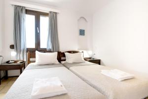 Posteľ alebo postele v izbe v ubytovaní Captain's Beach Apartments