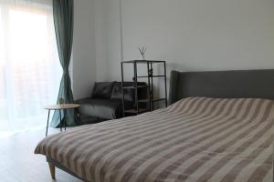 Fotografie z fotogalerie ubytování Studio cu grădina proprie v destinaci Popeşti-Leordeni