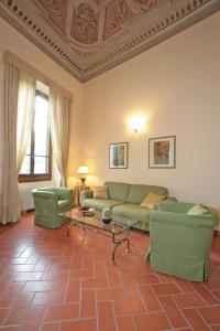 Posedenie v ubytovaní Palazzo Gamba Apartments al Duomo
