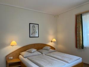 Postel nebo postele na pokoji v ubytování Hotel Altneudörflerhof