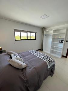 En eller flere senge i et værelse på El Diablo Chic - Style House