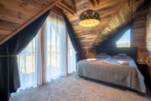 Ліжко або ліжка в номері Luxury Chalet in High Tatras