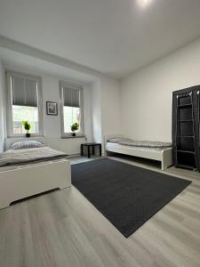 Säng eller sängar i ett rum på FeWo for max 6 Guests near Hagen-City