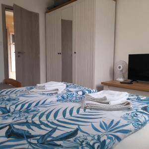 Posteľ alebo postele v izbe v ubytovaní Apartment Moravský Kras