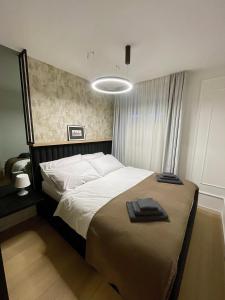 Postel nebo postele na pokoji v ubytování MV92 apartment