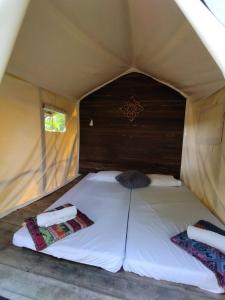 Postel nebo postele na pokoji v ubytování Hostal Payaca