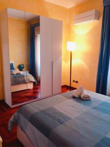 Łóżko lub łóżka w pokoju w obiekcie Alle Terme