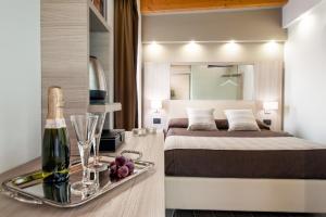 Postel nebo postele na pokoji v ubytování Hotel Trapani In