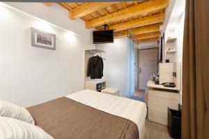 Postel nebo postele na pokoji v ubytování Hotel Trapani In