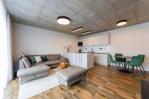A kitchen or kitchenette at H75 Apartments Kosice Centre