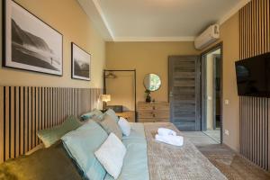 Un pat sau paturi într-o cameră la Balatonic Relax
