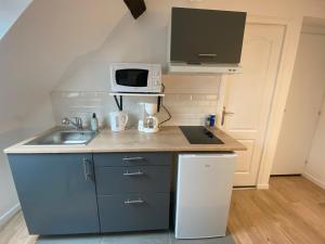 Kuchnia lub aneks kuchenny w obiekcie Cattleya location