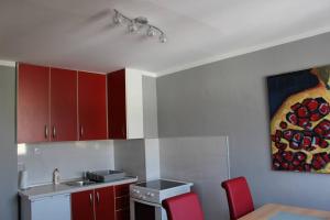 A kitchen or kitchenette at Comfortable apartment near the City Center