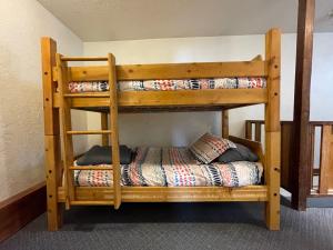 a bunk bed room with two bunk beds at Adventures Vacation Rentals in Lava Hot Springs